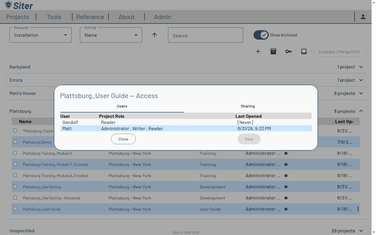 Manage Access dialog Users tab listing two users with their project roles and the Close and Save buttons